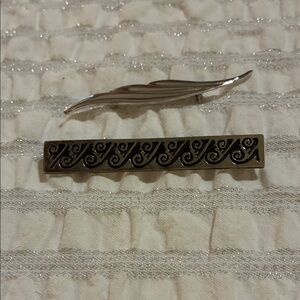 Elegant Silver and Black Brooch Set